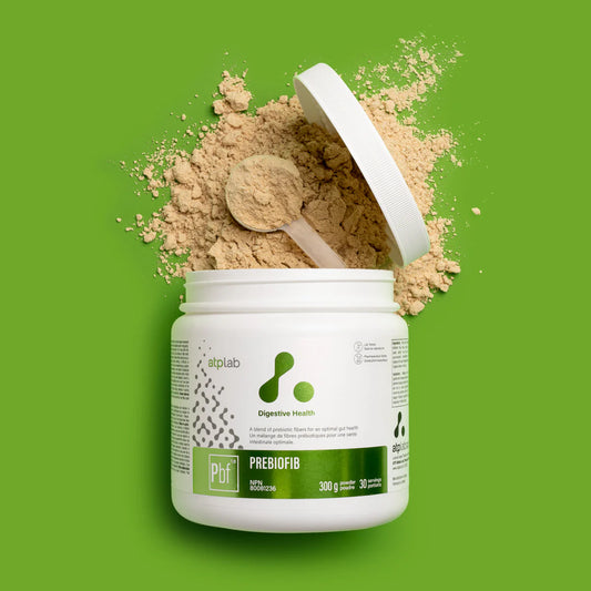Atplab Prebiobif prebiotic powder supplement container with scoop and powder on green background