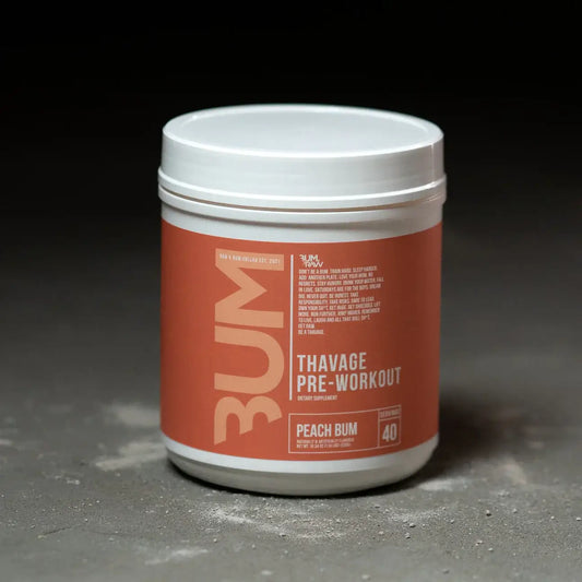 Raw Nutrition THAVAGE pre-workout Peach Bum tub on grey surface